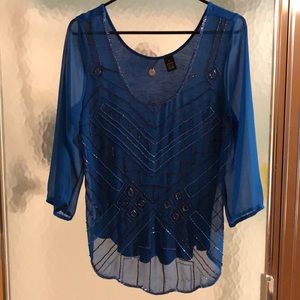 Sheer blue, beaded top.